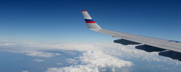 Вид из иллюминатора российского самолета во время полета Вид из иллюминатора российского самолета во время полета - Sputnik Армения