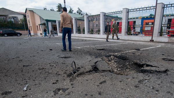 Последствия обстрелов Степанакерта (2 октября 2020). Карабах Последствия обстрелов Степанакерта (2 октября 2020). Карабах - Sputnik Армения