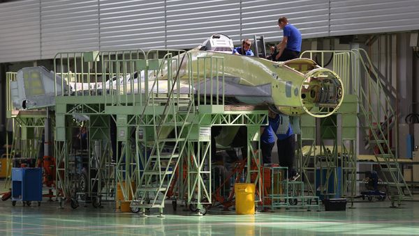 Сотрудники Российской самолетостроительной корпорации «МиГ» во время работы (14 июля 2017). Жуковский - Sputnik Армения