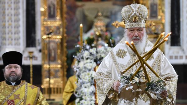 Патриарх Московский и всея Руси Кирилл во время Рождественского богослужения в храме Христа Спасителя в Москве - Sputnik Արմենիա