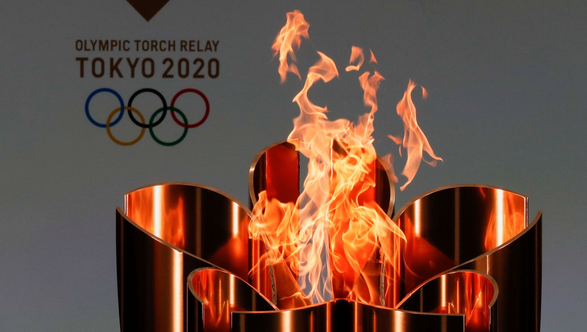 Олимпийский огонь во время эстафеты Олимпийского огня в Токио-2020 в префектуре Фукусима, Япония Олимпийский огонь во время эстафеты Олимпийского огня в Токио-2020 в префектуре Фукусима, Япония - Sputnik Армения, 1920, 07.07.2021