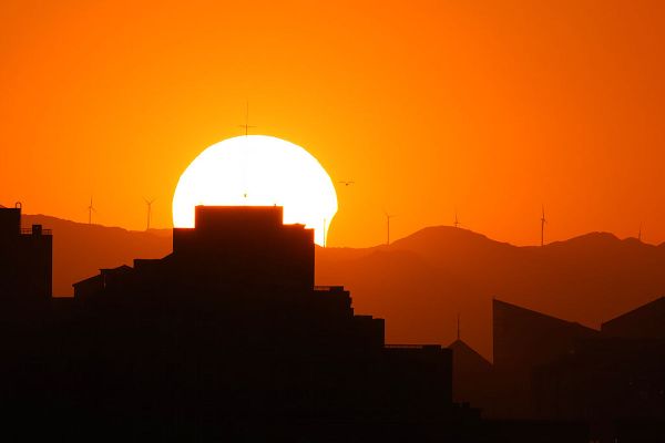 Частичное затмение солнца в Пекине Частичное затмение солнца в Пекине - Sputnik Армения