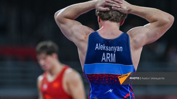 Поединок 1/8 финала по борьбе греко-римского стиля между Артуром Алексаняном (Армения) и Узур Джузупбеков (Кыргызстан) на XXXII летних Олимпийских играх (2 августа 2021). Токио - Sputnik Армения