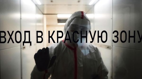 Медицинский сотрудник в госпитале для больных COVID-19 - Sputnik Армения