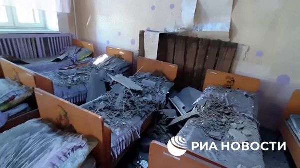 Кадры из детского сада, в крышу которого прилетел украинский снаряд - Sputnik Արմենիա