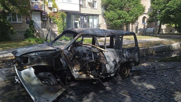 Взорванный автомобиль коменданта Бердянска - Sputnik Армения