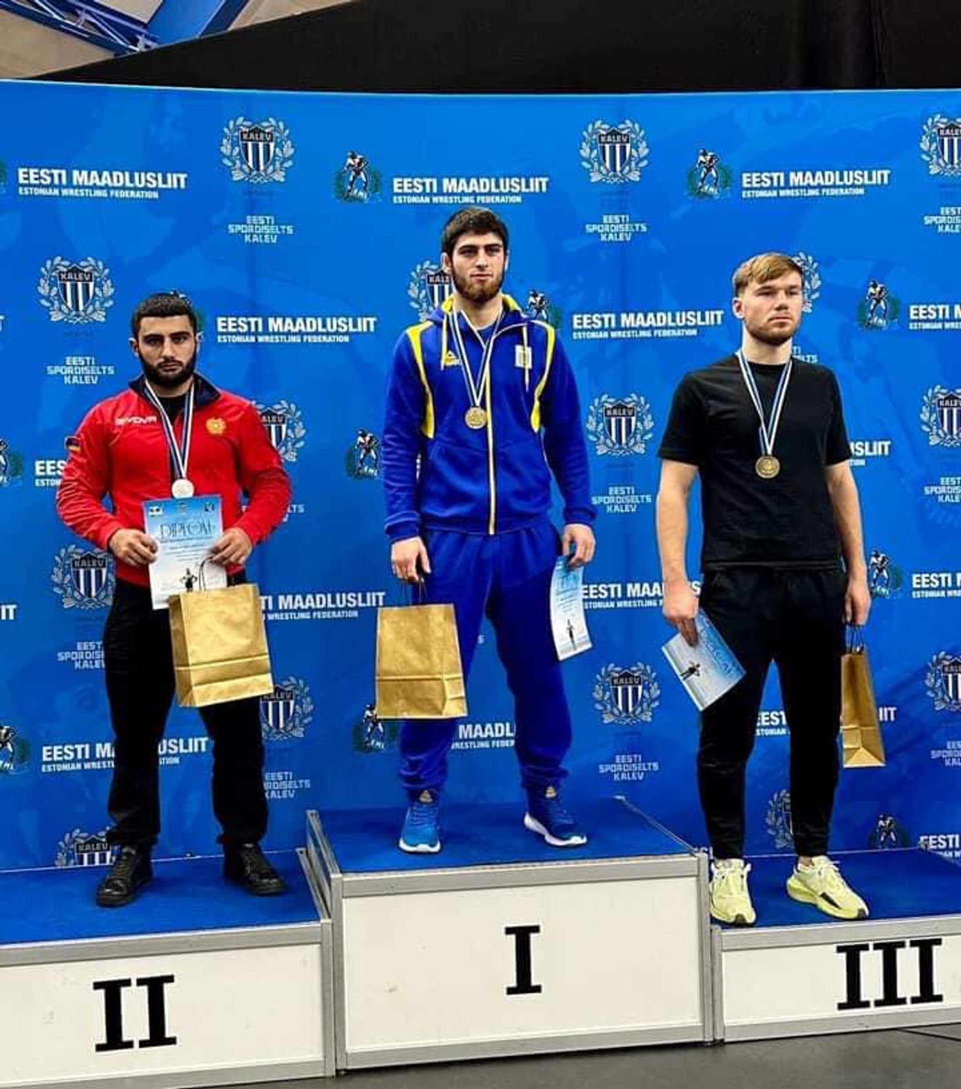 Победители на пьедестале почета чемпионата по борьбе имени Кристиана Палусалу в Талине - Sputnik Армения, 1920, 09.11.2022