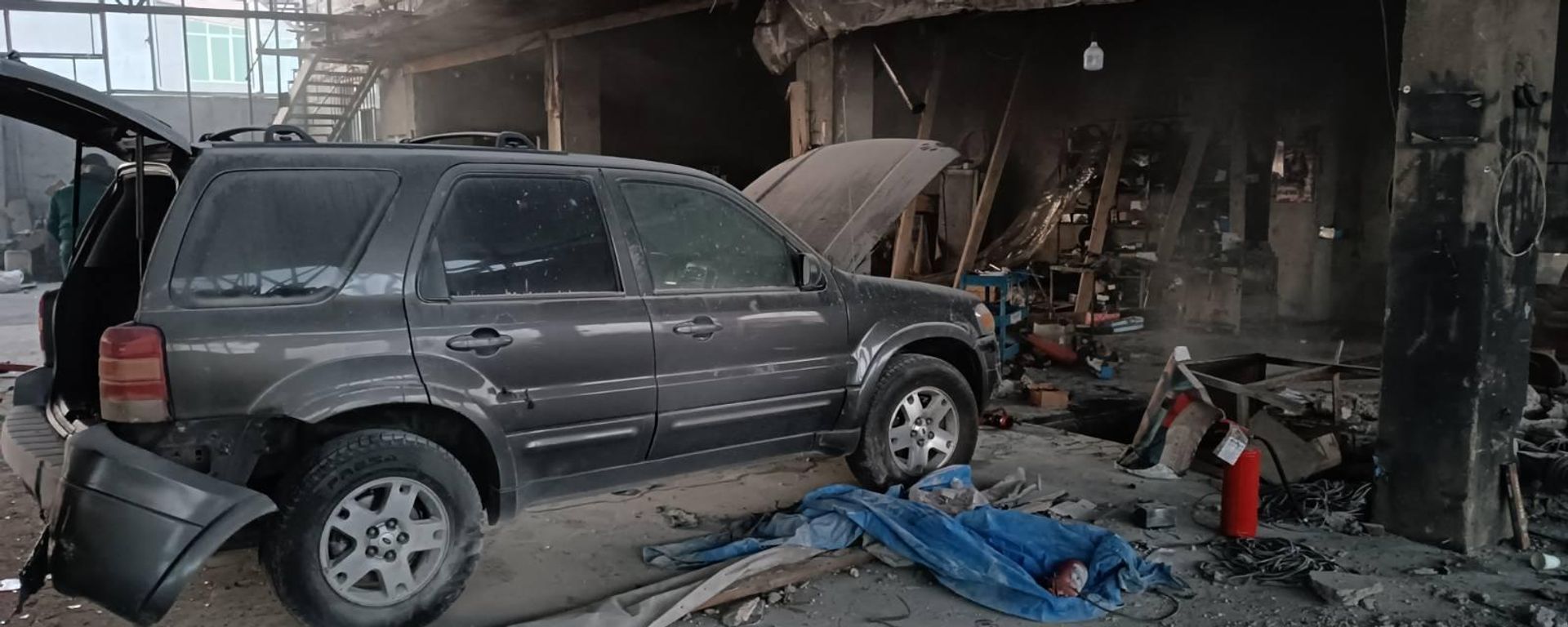 Разрушения после взрыва газового баллона в автомастерской села Зовуни (17 января 2023). Котайк - Sputnik Армения, 1920, 17.01.2023