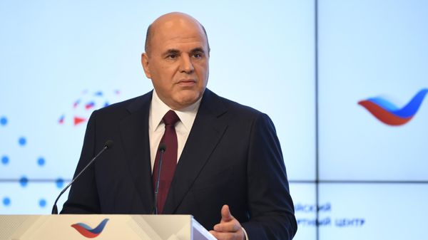 Председатель правительства РФ Михаил Мишустин выступает на пленарной дискуссии Экономика третьего десятилетия: вызовы и возможности для российского экспорта в Международном мультимедийном пресс-центре МИА Россия сегодня (9 декабря 2020). Москва - Sputnik Армения