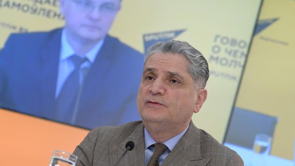 Зампред правления ЕАБР Тигран Саркисян во время телемоста Цифровые проекты стран ЕАЭС в мультимедийном пресс-центре МИА Россия сегодня (29 мая 2024). Москвa - Sputnik Армения
