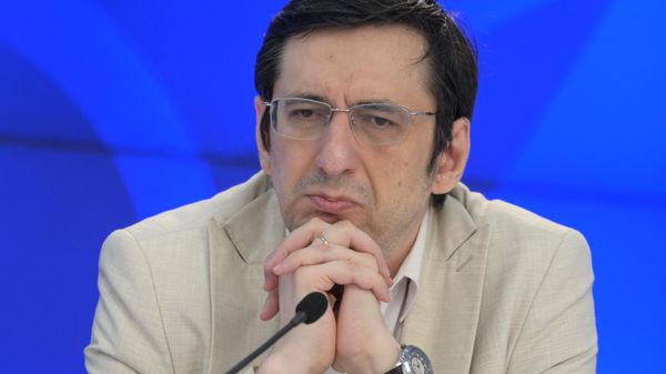 Андрей Арешев во время круглого стола в формате видеомоста Москва – Ереван (18 июня 2024). Москва - Sputnik Армения