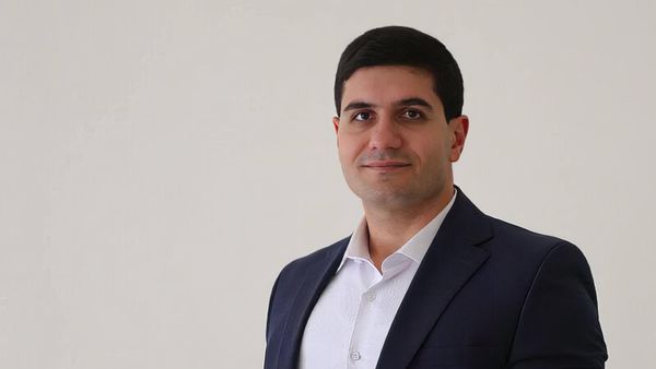 Старший преподаватель кафедры экономической теории и проблем экономики переходного периода РАУ Гарик Петросян - Sputnik Армения