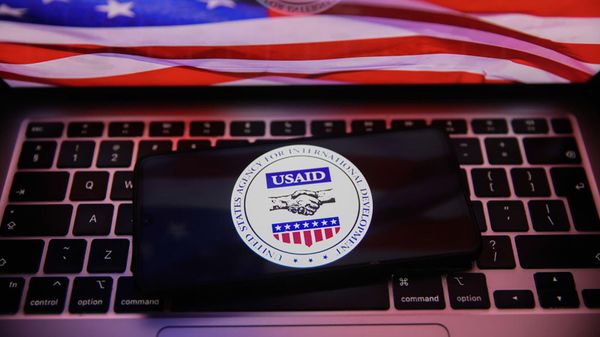 Логотип US AID на клавиатуре - Sputnik Армения