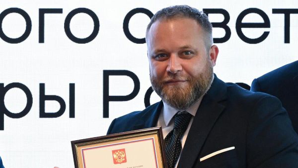 Корреспондент Международной медиагруппы Россия сегодня Иван Зуев на церемонии награждения за заслуги в развитии средств массовой информации (2 июля 2025). Москвa - Sputnik Армения
