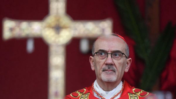 Кардинал Пьербаттиста Пиццабалла, латинский патриарх Иерусалима, проводит молитвенное служение в честь Вербного воскресенья (29 марта 2026). Иерусалим - Sputnik Армения