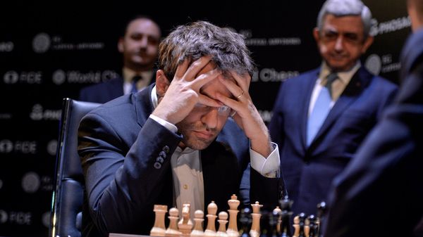 Партия Левон Аронян - Дин Лирен на турнире претендентов на звание чемпиона мира по шахматам (10 марта 2018). Берлин, Германия - Sputnik Армения