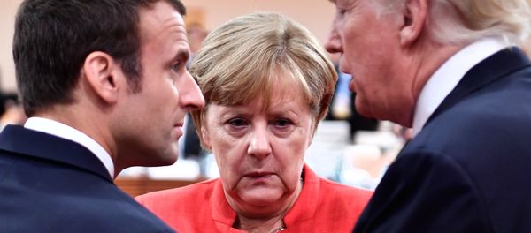 Президент Франции Эммануэль Макрон, канцлер Германии Ангела Меркель и президент США Дональд Трамп во время встречи G20 (7 июля 2017). Гамбург, Германия Президент Франции Эммануэль Макрон, канцлер Германии Ангела Меркель и президент США Дональд Трамп во время встречи G20 (7 июля 2017). Гамбург, Германия - Sputnik Армения