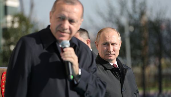 Президенты России и Турции Владимир Путин и Реджеп Тайип Эрдоган на церемонии запуска строительства первого энергоблока атомной электростанции Аккую (3 апреля 2018). Анкара - Sputnik Армения