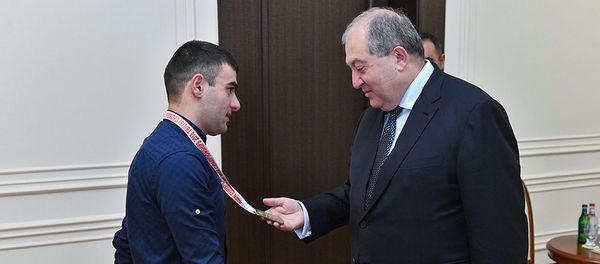 Президент Армен Саркисян принял призера открытого чемпионата Европы по силовому троеборью среди паралимпийцев Геворга Африкяна (1 декабря 2018). Еревaн - Sputnik Արմենիա
