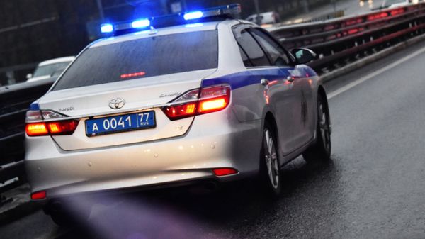 Автомобиль полиции на дороге в Москве. Автомобиль полиции на дороге в Москве. - Sputnik Армения
