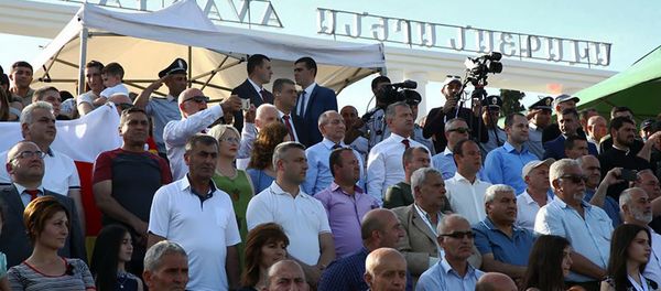 Болельщики на трибуне Авагян Арена во время футбольного матча ConIFA между сборными Восточной Армении и Южной Осетии (2 июня 2019). Мартуни - Sputnik Արմենիա