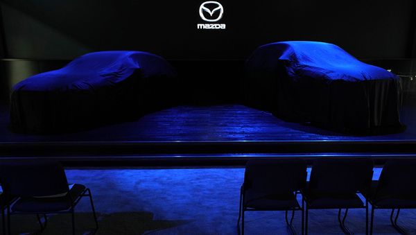 Стенд с новыми автомобилями Mazda во время пресс-дней международного автосалона 2019 (17 апреля 2019). Нью-Йорк - Sputnik Արմենիա