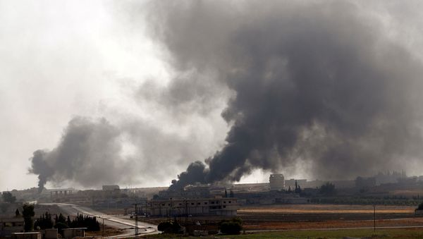Дым над сирийским городом Тель-Абьяд (10 октября 2019). Сирия Дым над сирийским городом Тель-Абьяд (10 октября 2019). Сирия - Sputnik Արմենիա