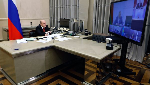 Премьер-министр России Михаил Мишустин во время межправительственного совета ЕЭК (10 апреля 2020). Москвa - Sputnik Армения