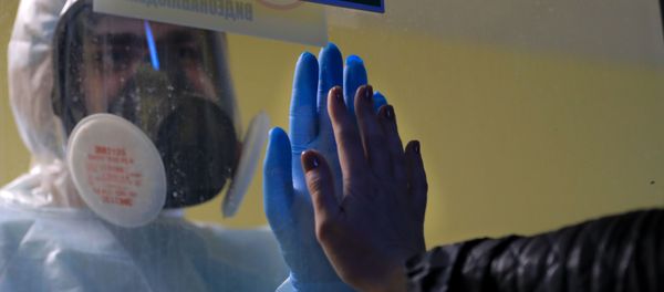 Медицинский работник в стационаре для больных COVID-19 в Тверской областной клинической больнице Медицинский работник в стационаре для больных COVID-19 в Тверской областной клинической больнице - Sputnik Армения
