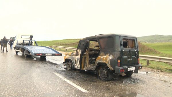 СПУТНИК_Искореженные автомобили на месте подрыва автоколонны МВД в Дагестане - Sputnik Армения