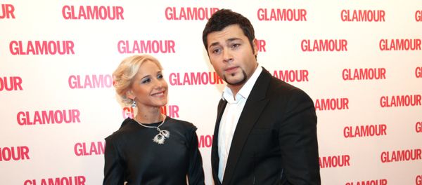 Ю.Ковальчук и А.Чумаков после церемонии вручения премии Женщина года Glamour 2009 Ю.Ковальчук и А.Чумаков после церемонии вручения премии Женщина года Glamour 2009 - Sputnik Армения